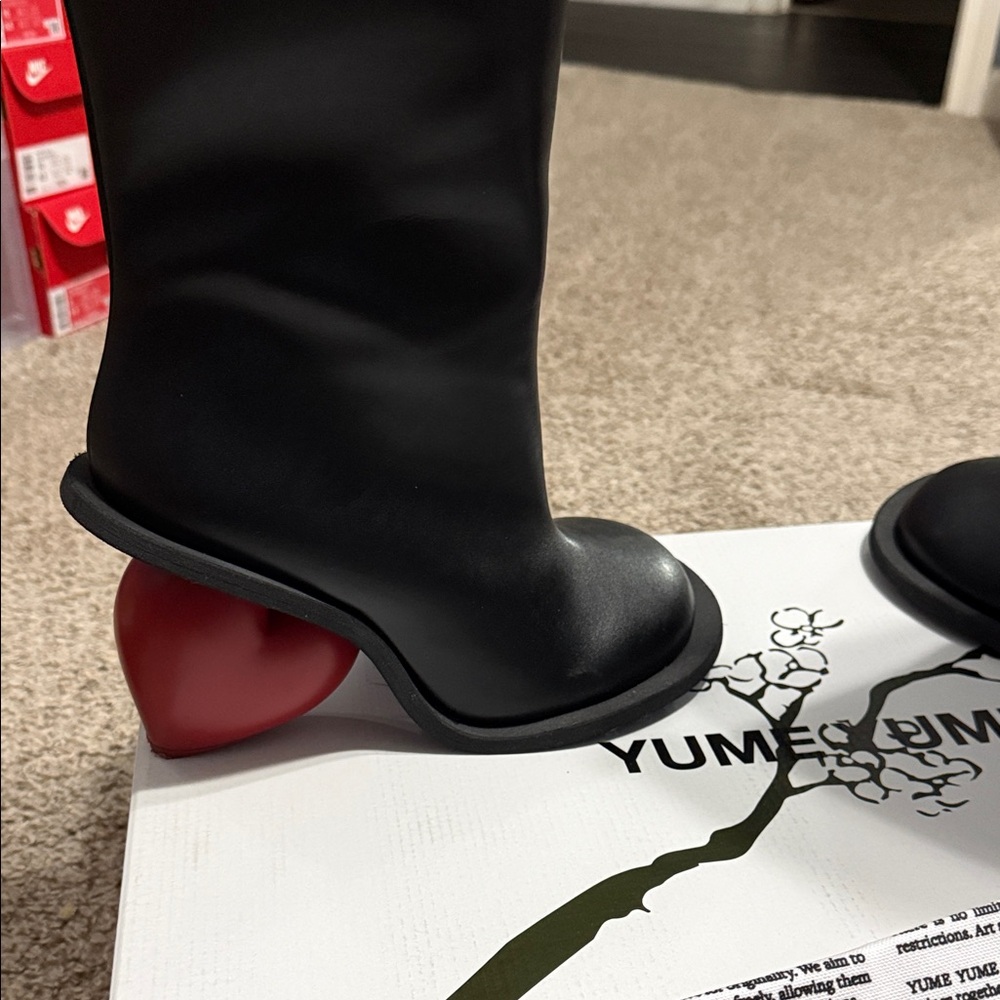 Elegant Black Boots with Red Heart Heel
